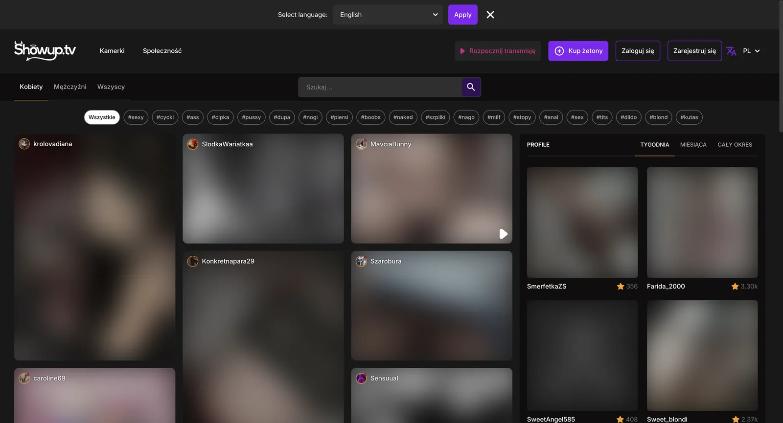 ShowUp.tv community tab showing a search field, a row of twenty hashtag chips, a feed of performer posts, and a profile leaderboard with week, month and all-time tabs